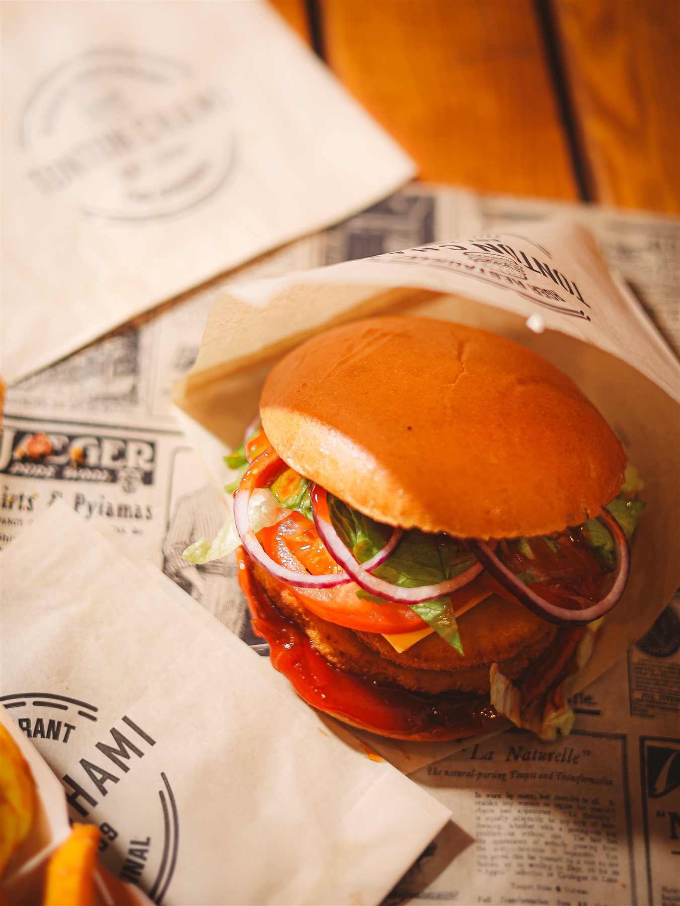 Burger Tonton Chami servi dans son papier