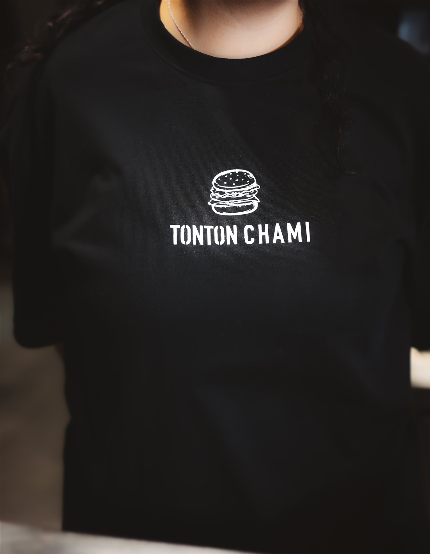Tenue d'équipe Tonton Chami avec le logo de la marque